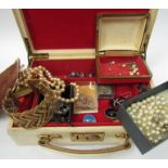 A box of bijouterie including faux pearl necklaces, bangle,