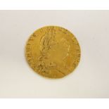 A George III 1794 gold guinea, worn, 8.