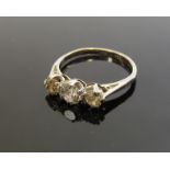 A white gold diamond three stone ring .80ct total approx, stamped 18ct. Plat. Size K/L, 2.