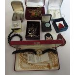 A box of bijouterie including earrings stamped 925, brooches,