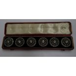 A set of Victorian buttons with clear glass stones in a fitted case,