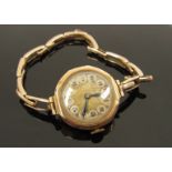 A 9ct gold cased lady's wristwatch on expandable strap, 17.