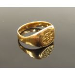 A gents gold signet ring, monogrammed, slightly miss-shapen, stamped 18ct. Size R/S, 5.