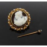 A gold cameo brooch depicting Elizabeth I, in seed pearl frame,