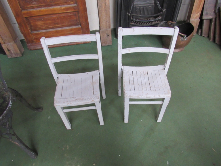 Two chidren's wooden school chairs