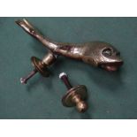 A 19th Century brass dolphin door knocker,