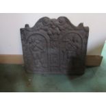 A cast iron fire back. 56 x 61.