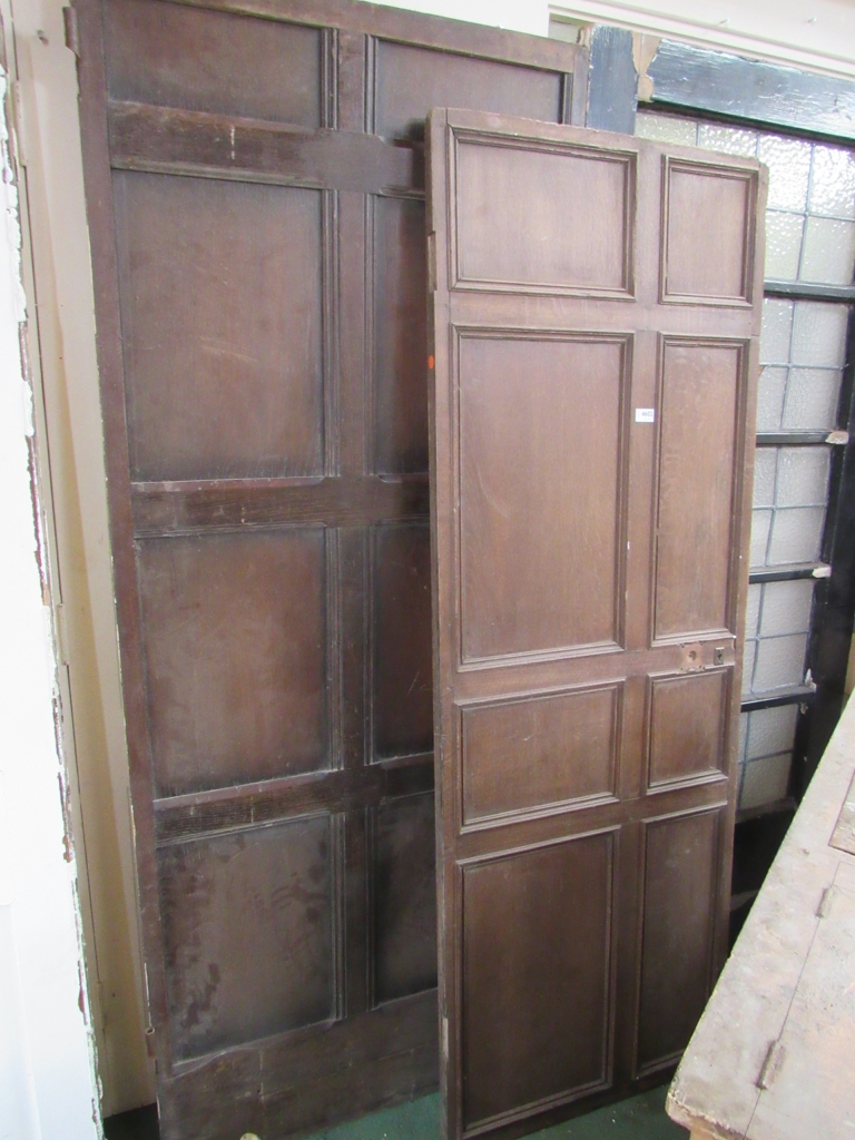 Two panelled oak doors. 186.5 x 66.