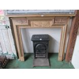 A 19th Century stripped pine fire surround.