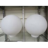 Two opaque globular light shades