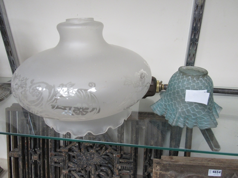 A gas bracket with decorative glass shade and another shade (2)