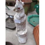 A soapstone cockatoo-shaped water feature.