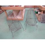 A pair of 1930's wirework garden chairs