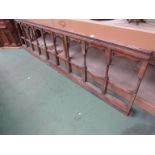 A pitch pine balastraude/ altar rail.