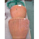 A pair of ribbed terracotta wall pockets. 29.