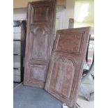 Two various carved oak cupboard doors. 95.5 x 54.