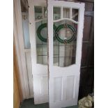 A 1920s painted pine French door, with coloured lead glass.