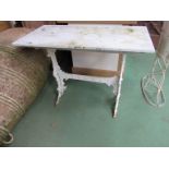 A cast base, marble top table. 98.