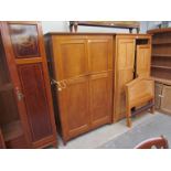 An oak double wardrobe made by Thorpe, Rose of York, North Yorkshire,