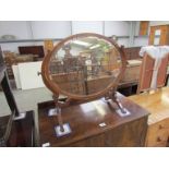 A 1930's inlaid mahogany oval dressing table swing mirror,