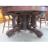 A Victorian oak extending table,