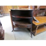 A Georgian mahogany corner washstand with two faux and single drawers