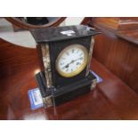 A Victorian slate mantel clock with French 8-day movement,