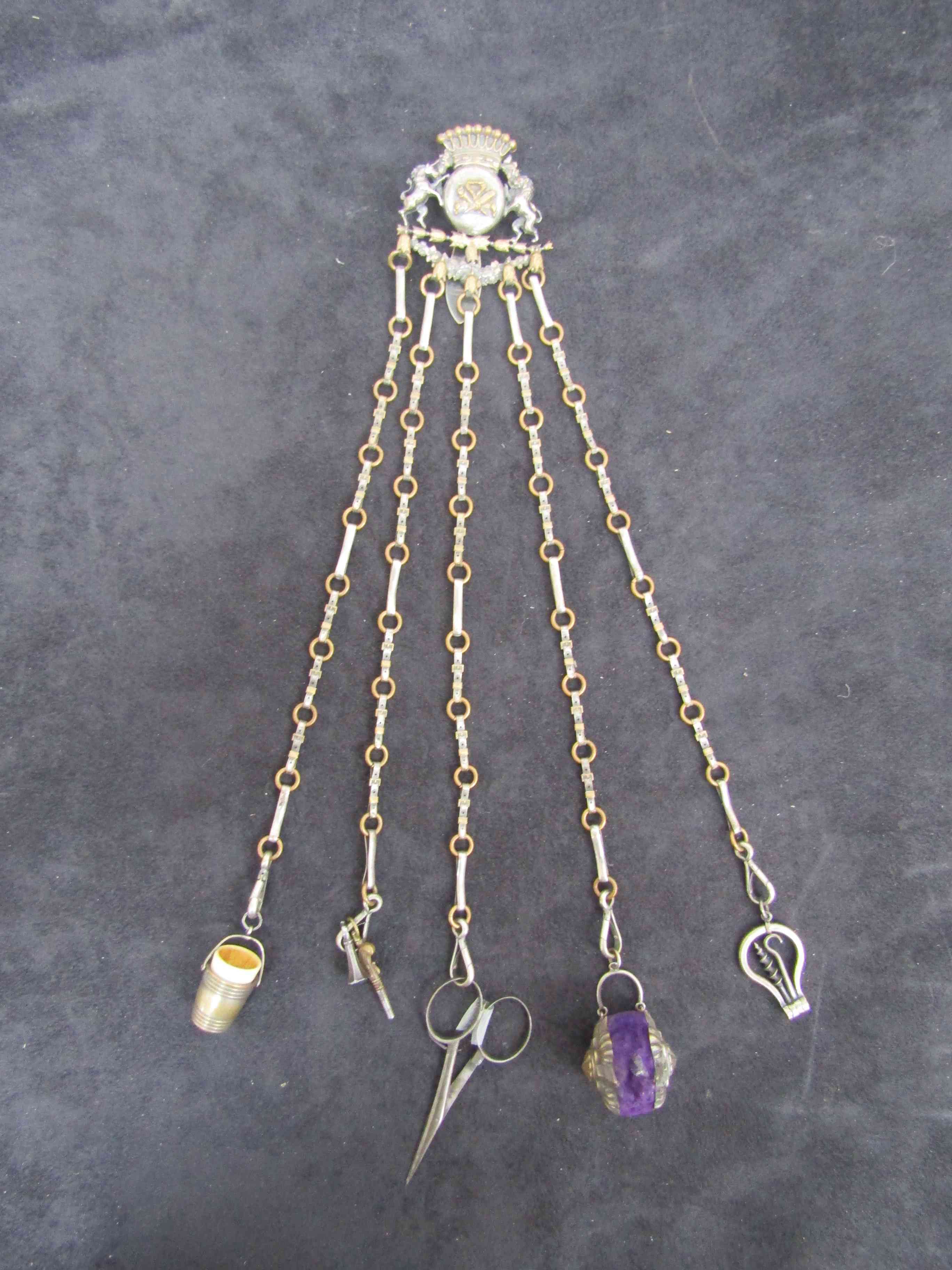 A 19th Century five-strand steel and brass chatelaine,