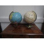 Two mid - late 20th Century world globes on stands: a Phillips 12" Political Challenge globe and a