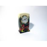 A Moorcroft Satin Flower pattern clock designed by Nicola Slaney, 16cm tall,