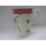 A Lowestoft porcelain polychrome large cylindrical mug painted with a hanging Chinese urn of