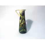 A Moorcroft Iris decorated jug designed by Rachel Bishop, Moorcroft Collectors Club piece,