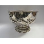 An Alexander Clark and Co Ltd silver rose bowl with foliate and swag decoration, monogrammed,