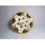 A Grainger Company of Worcester hand painted and gilt bird design porcelain cabinet plate,