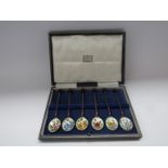 A Harrods enamelled spoon set of six coffee spoons with floral decoration, Cohen and Charles,