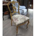 A Victorian gilt bedroom chair with acanthus detail,