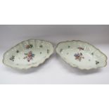 A pair of late 18th / early 19th Century hand painted lozenge form dishes with gilt border and