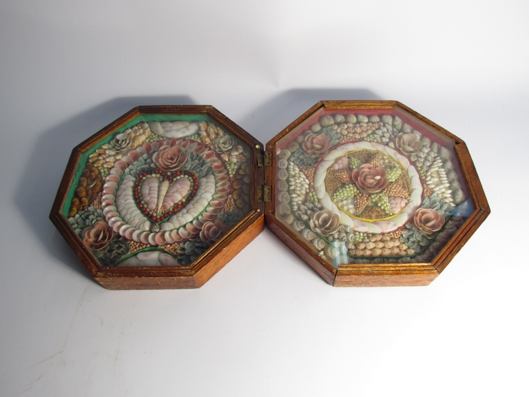 A Victorian mahogany framed Sailors Valentine the hexagonal box opening to reveal two shell