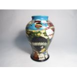 A Moorcroft Up Up and Away pattern vase, designed by Paul Hilditch, limited edition 86/200,