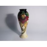 A Moorcroft Anna Lily pattern vase designed by Nicola Slaney,