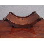 An early 19th Century mahogany cheese coaster,