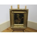 A 18th Century oil painting of mother and child, gilt frame, 18cm x 15cm.
