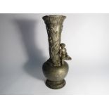 A Spelter Art Nouveau vase, boy fishing,