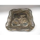 A Faudel Phillips and Sons silver pierced square form dish with cherub detail, London 1903,
