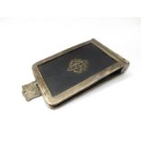 A Victorian silver notepad with leather sections and panels, monogrammed cartouche,