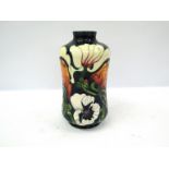 A Moorcroft Miss Alice pattern vase, designed by Emma Bossons, 21cm tall,