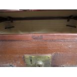 A canvas and leather steamer trunk by Harrods, monogrammed A.L.