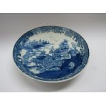 A Lowestoft porcelain blue and white transfer printed Willow pattern influenced saucer dish.