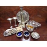 A collection of plated items including bud vases, salts, milk jug, pierced basket,