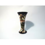 A Moorcroft The Athletes vase, designed by Kerry Goodwin,